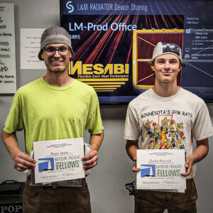 Two students who work at L&M Radiator through the Next IASC Career Pathways program.
