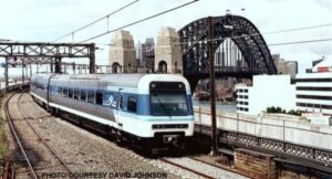 Photo courtesy of David Johnson with Southern Rail Models. A passenger train chugging through Sydney, Australia.